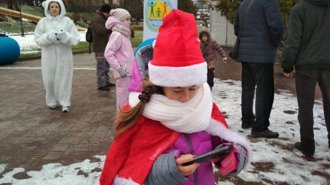 На Набережній у святкових костюмах бігали Санти, фото №3 на сайті 20minut.ua