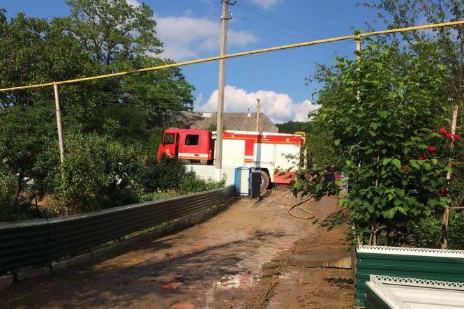 Затоплені будинки та вулиці: наслідки потужної зливи на  Хмельниччині, фото №2 на сайті vsim.ua