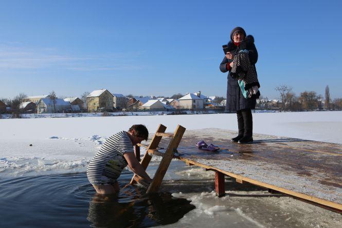 «Водичка хороша й тепла!» Як у Вінниці святкують Водохреща (ФОТО- та ВІДЕОРЕПОРТАЖ), фото №7 на сайті 20minut.ua