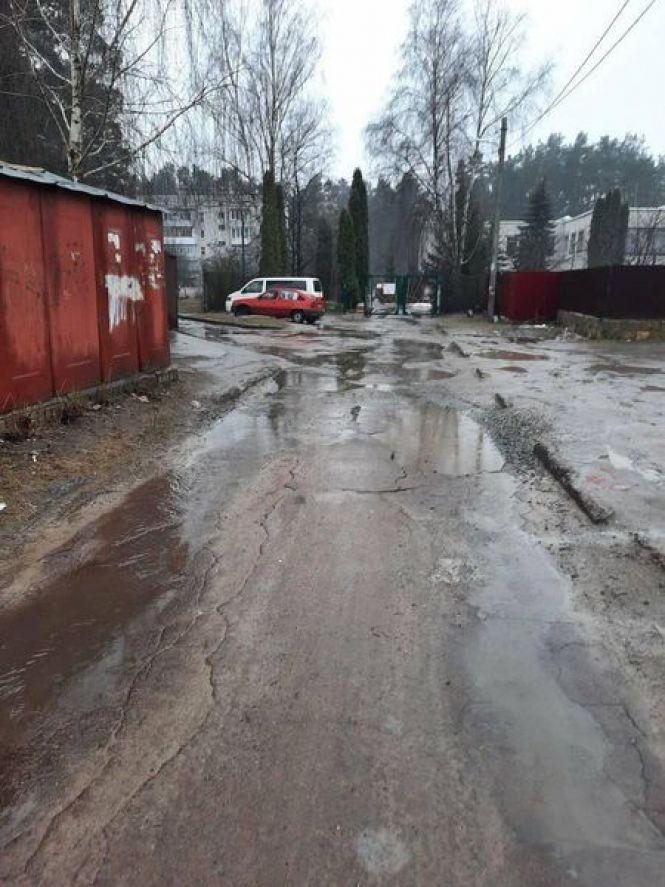 Новини Житомира - фото з Фото дня: ями і багнюка замість асфальту - житомирська Богунія