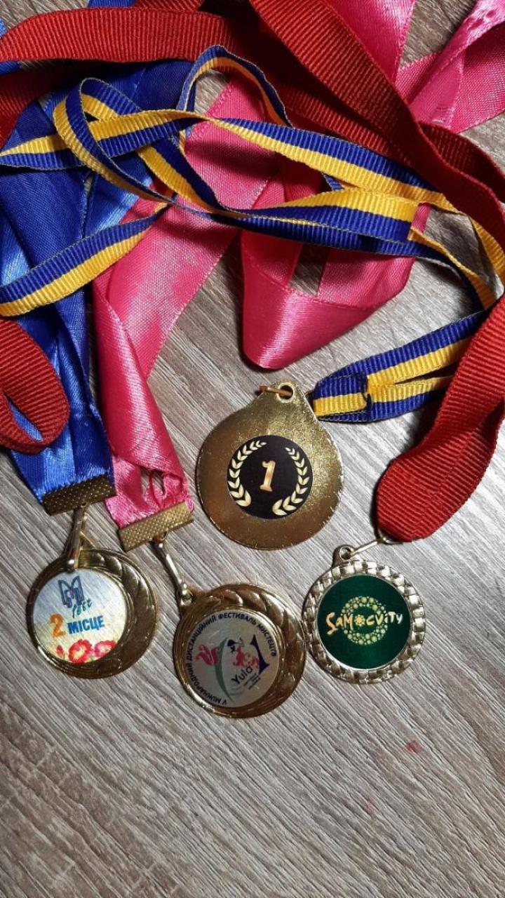 Новини Вінниці - фото з Малюнок юної козятинчанки буде на всіх кавових стаканчиках заправок WOG