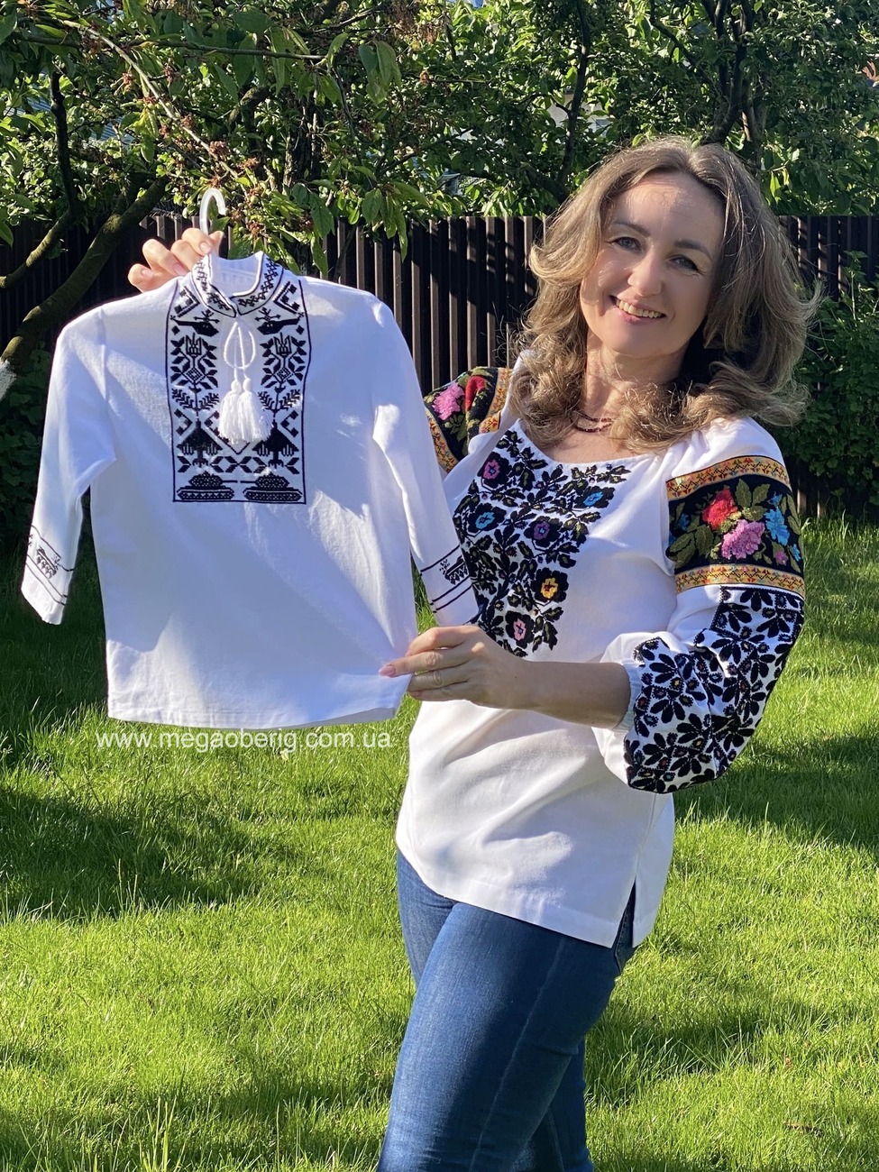 На зображенні може бути: 1 особа та текст «wWw www.megaobenig com www.megaoberg.com.ua ua»