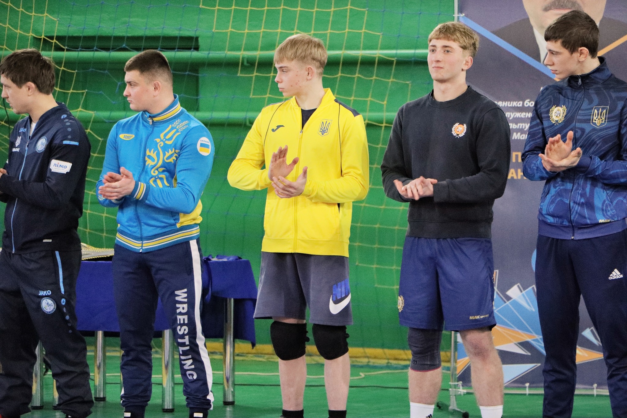 Новини Тернополя - фото з Всеукраїнський турнір з вільної боротьби започаткували у Теребовлі На зображенні може бути: 5 людей та текст «A Poиom MiMO NIMO aHиKa 6o nyжeHb ሚጣርካ лTy Mai n AH JAMO adidas MACИHR WRESTLING TLING»